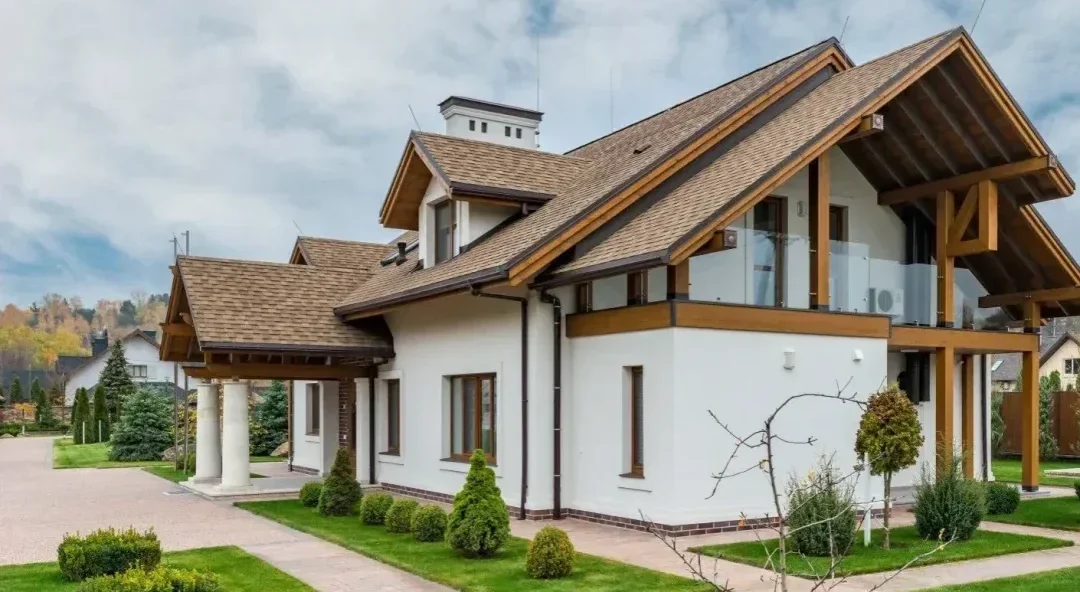 Calgary home with freshly painted white exterior walls and wood trim